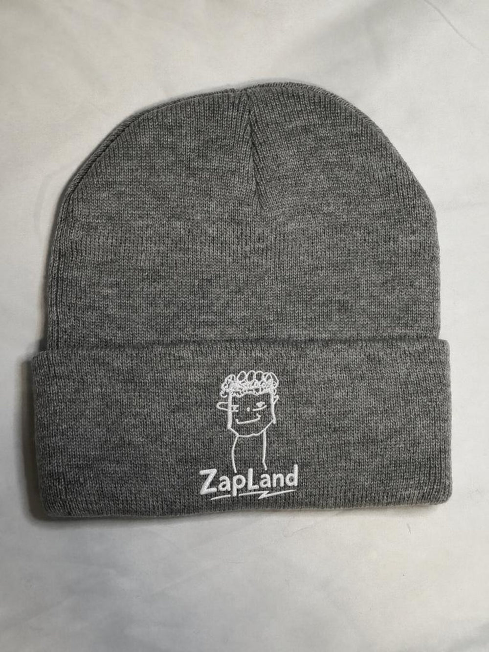 Heather grey beanie with custom ZapLand artwork embroidered on the cuff