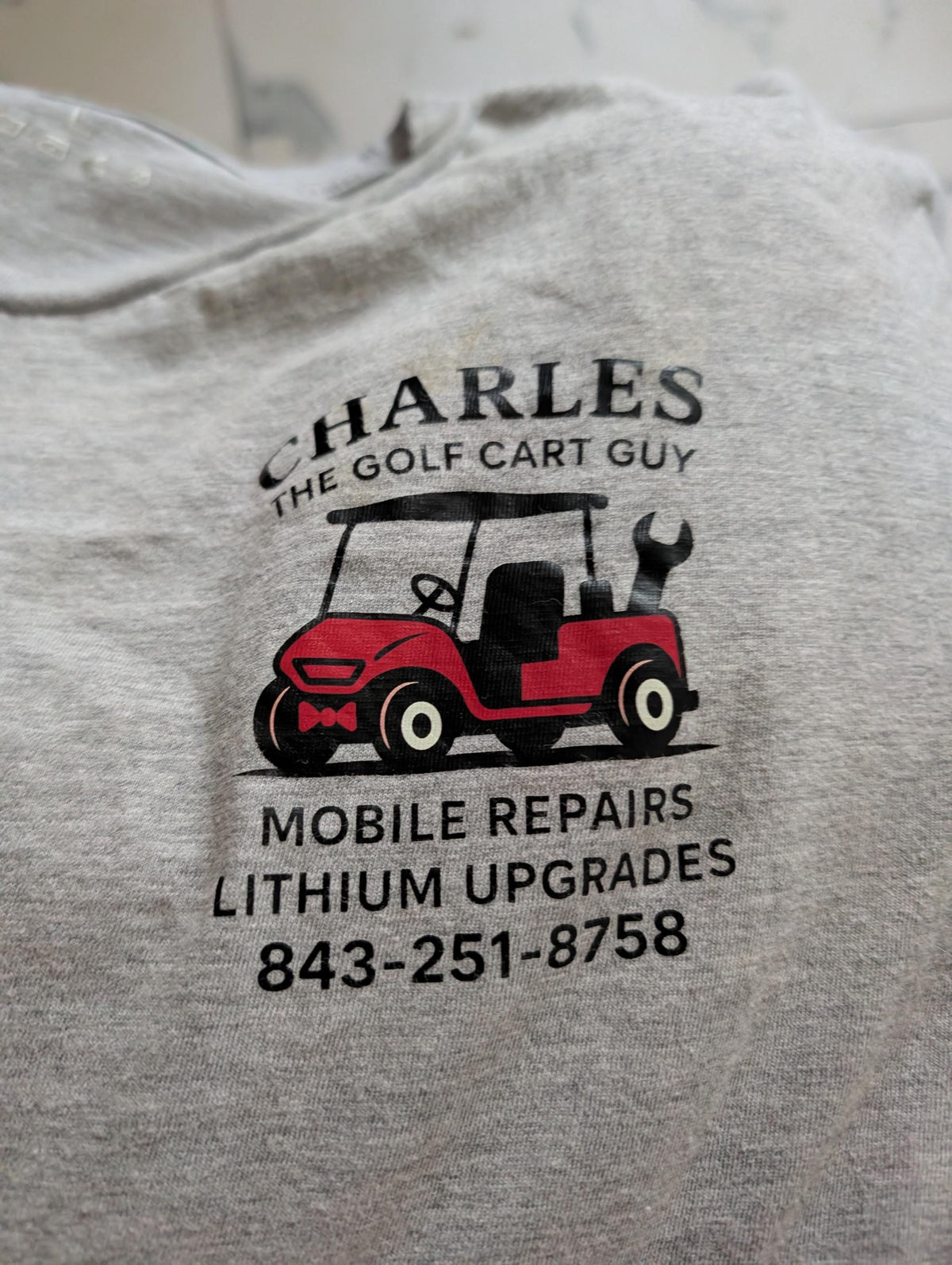 Custom business logo printed on a shirt