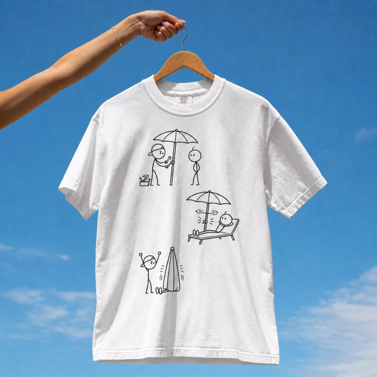 Tuft & Brow Umbrella Trap comic T-shirt mockup on white, showing three staggered scenes